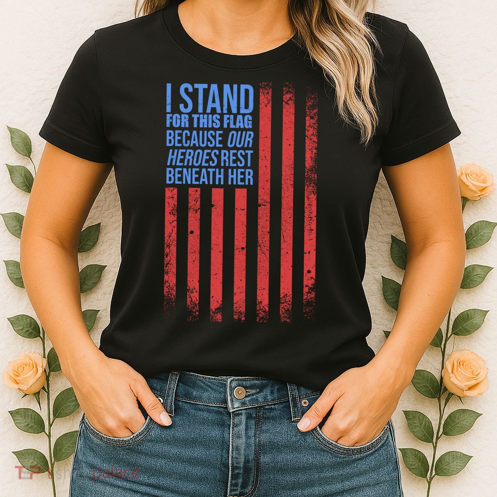 I stand for the flag because hero's lay beneath it. Women's T-Shirt
