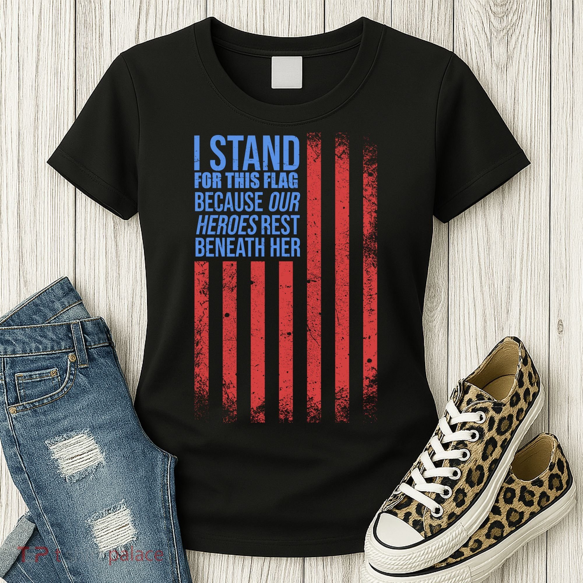 I stand for the flag because hero's lay beneath it. Women's T-Shirt