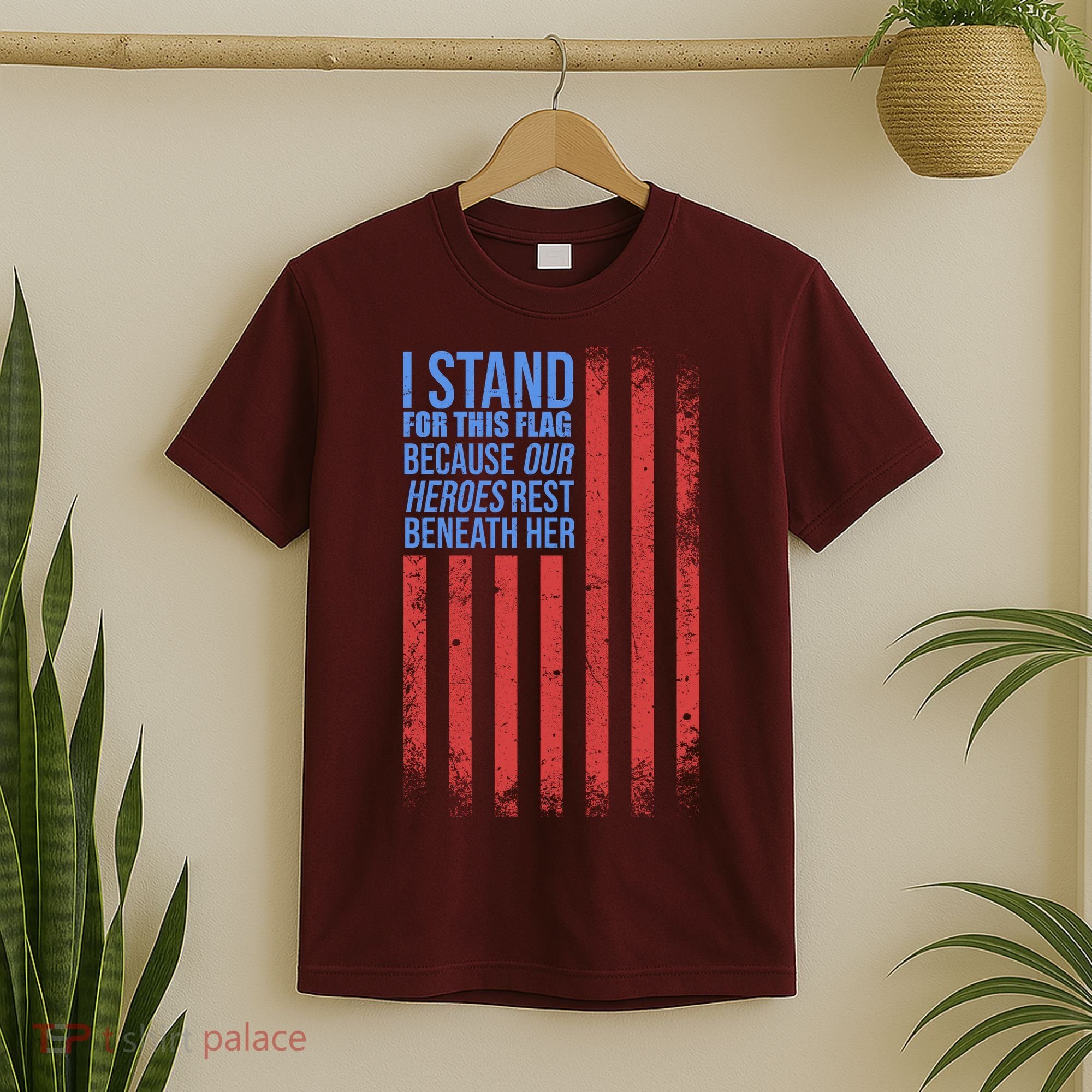 I stand for the flag because hero's lay beneath it. T-Shirt