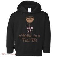A Bride In A Tini Bit Cocktail Bow Coquette Bachelorette Toddler Hoodie thumb 0