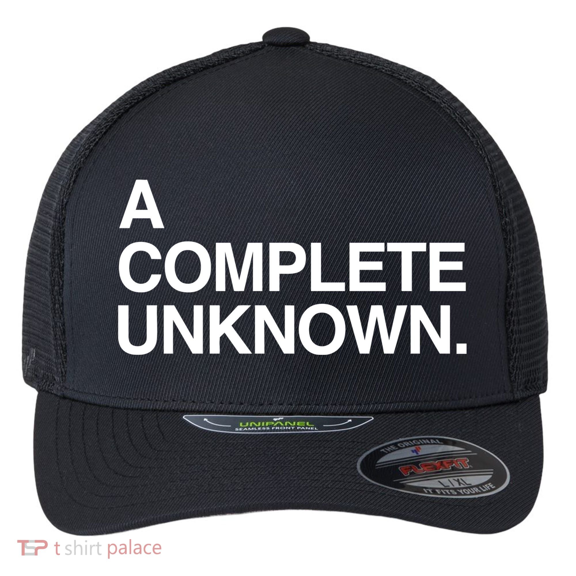A Complete Unknown Flexfit Unipanel Trucker Cap