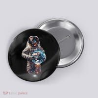Astronaut Holds Earth In Space Button thumb 0