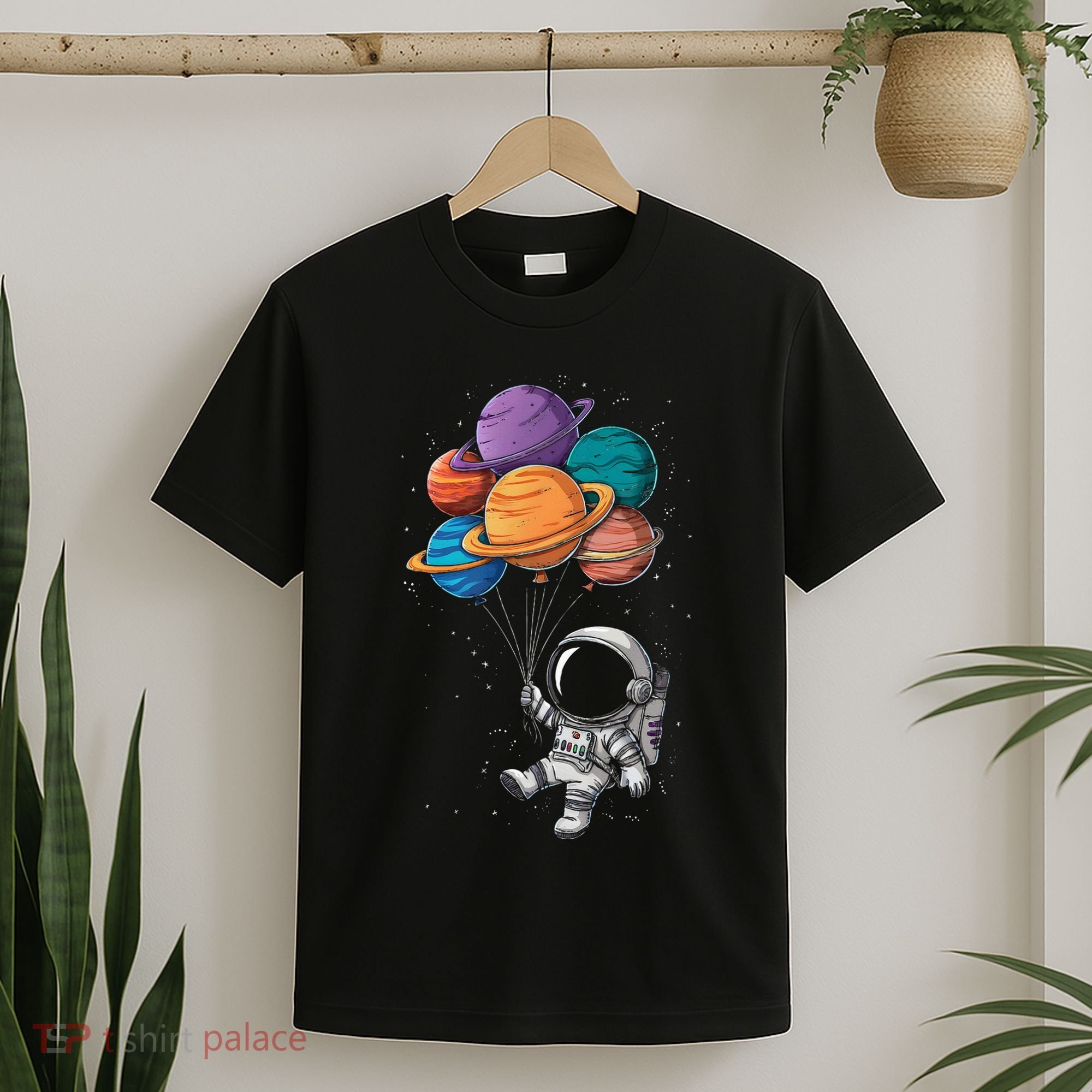Astronaut Holding Planet Balloons Floating In Space T-Shirt