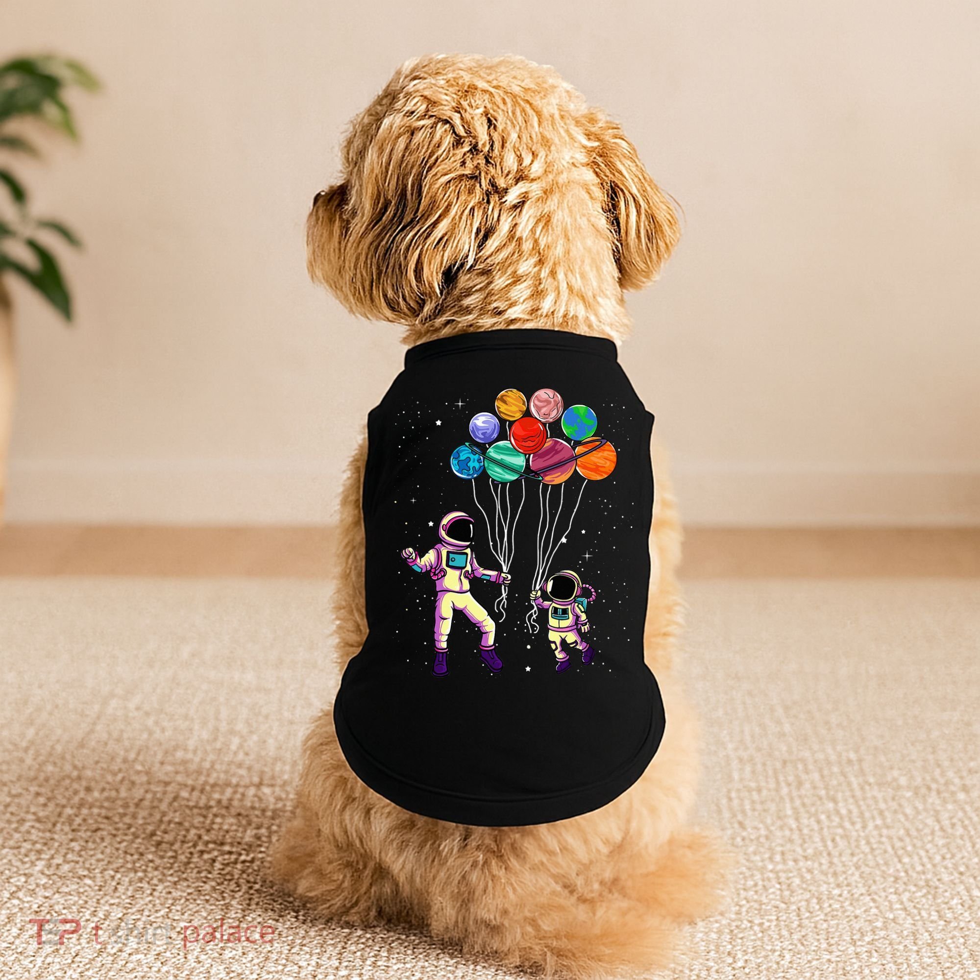 Astronaut Holding Planet Balloons STEM place Doggie Tank