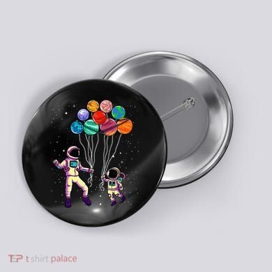 Astronaut Holding Planet Balloons STEM place Button