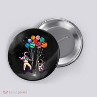 Astronaut Holding Planet Balloons STEM place Button thumb 0