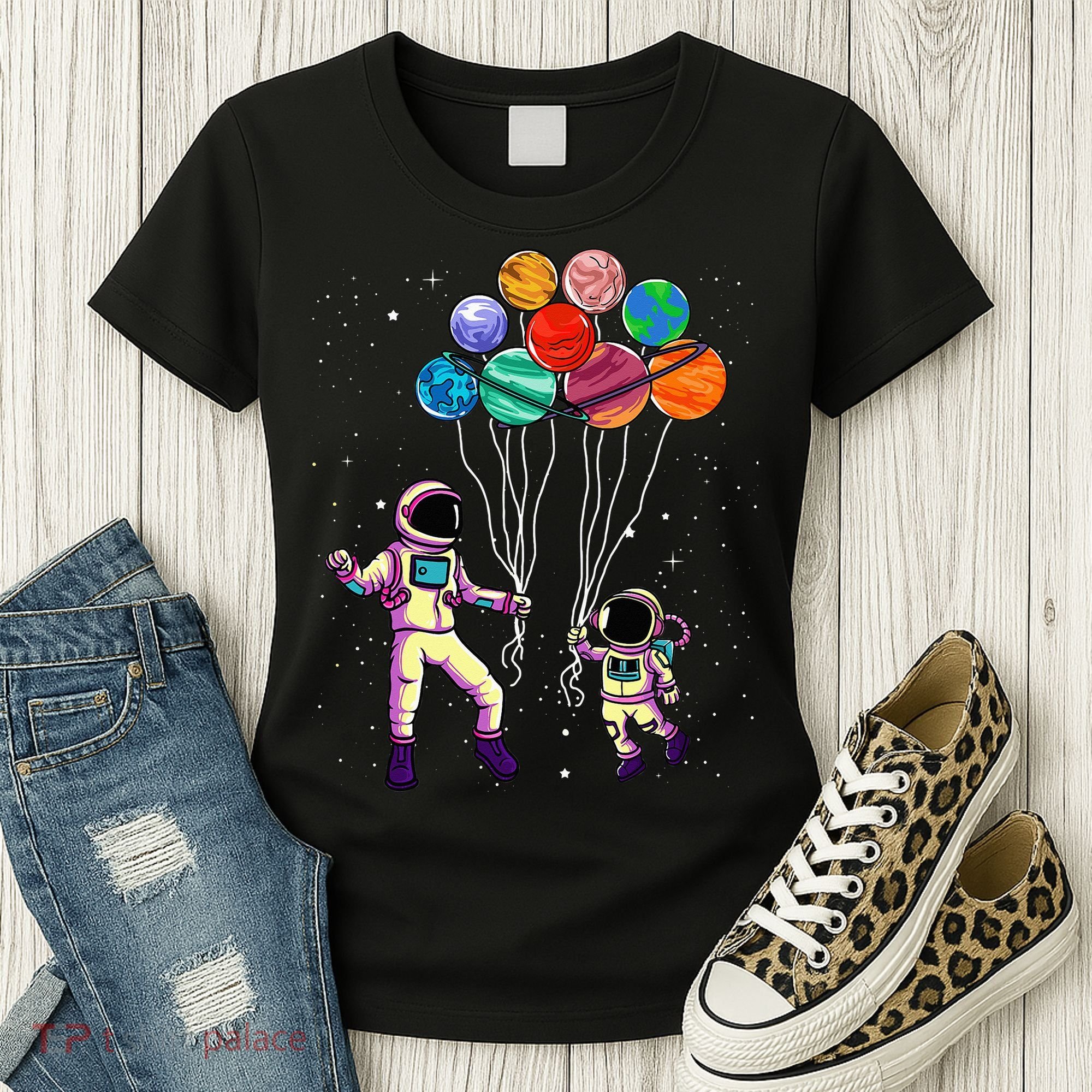 Astronaut Holding Planet Balloons STEM place Women's T-Shirt