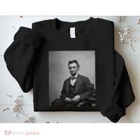 Abraham Lincoln Seated And Holding His Spectacles And A Pencil On Feb 1865 Sweatshirt thumb 2