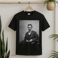 Abraham Lincoln Seated And Holding His Spectacles And A Pencil On Feb 1865 T-Shirt thumb 2