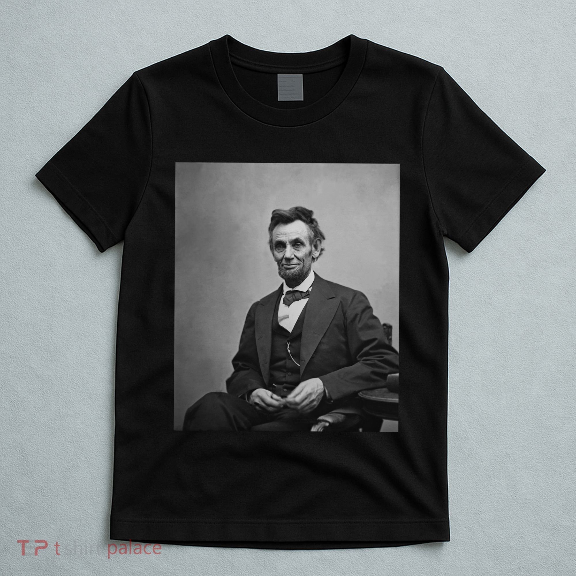 Abraham Lincoln Seated And Holding His Spectacles And A Pencil On Feb 1865 T-Shirt