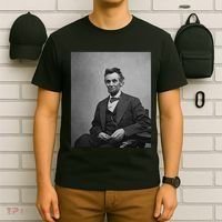 Abraham Lincoln Seated And Holding His Spectacles And A Pencil On Feb 1865 T-Shirt thumb 6