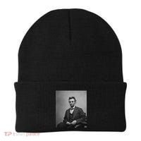 Abraham Lincoln Seated And Holding His Spectacles And A Pencil On Feb 1865 Beanie thumb 0