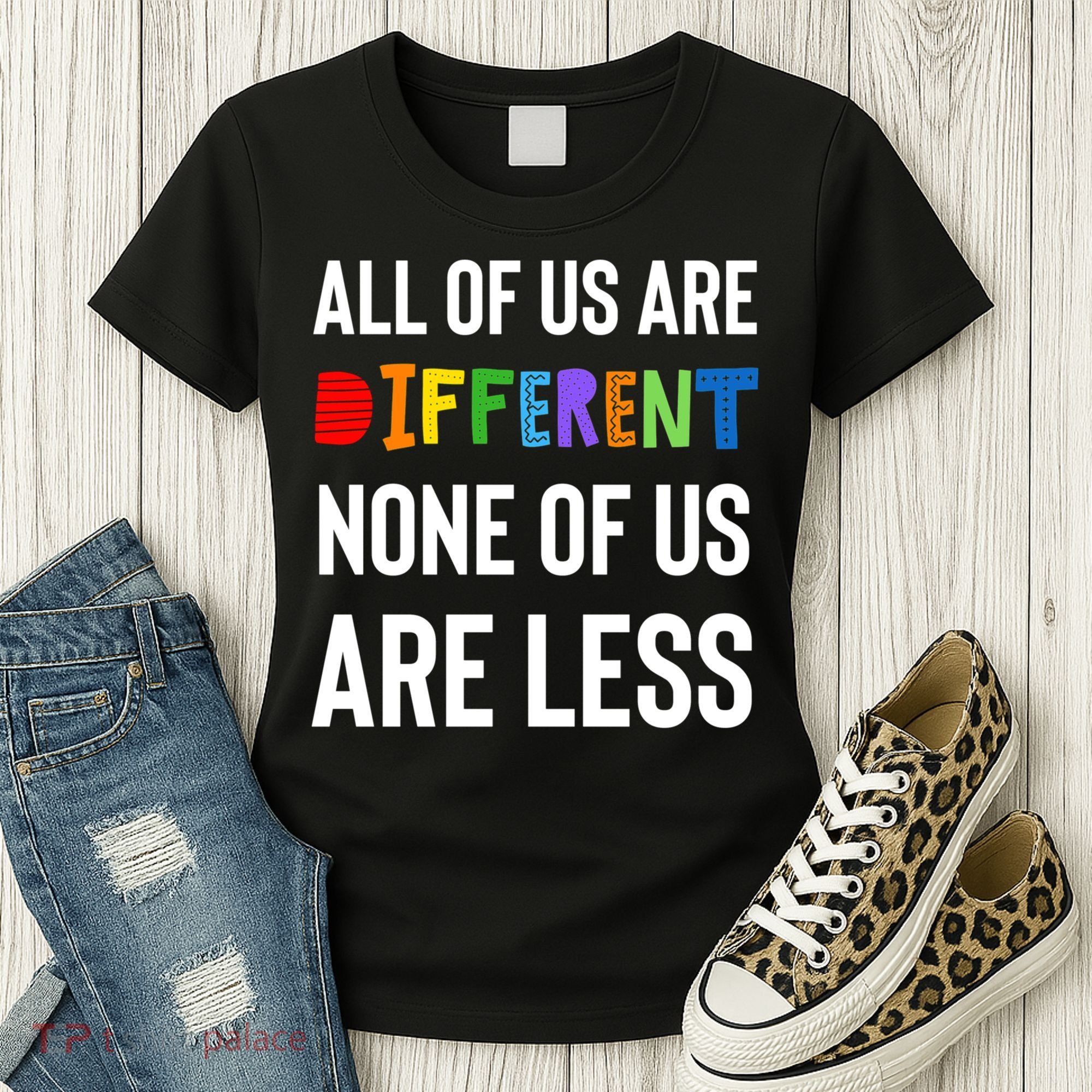 All Of Us Are Different. None Of Us Are Less. Women's T-Shirt