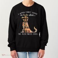 A Woman Cannot Survive On Books Alone She Also Needs Dogs Women's Sweatshirt thumb 0