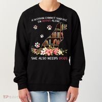 A Woman Cannot Survive On Books Alone She Also Needs Dogs Women's Sweatshirt thumb 0