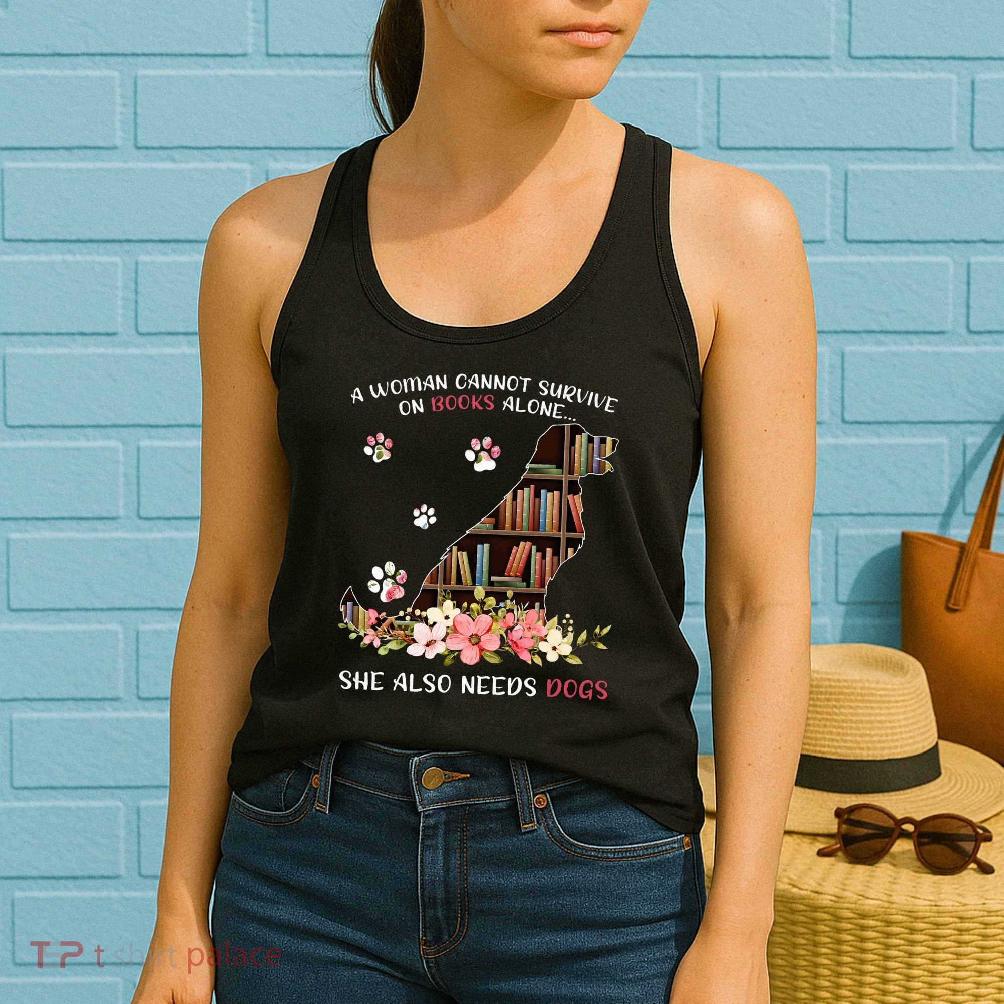A Woman Cannot Survive On Books Alone She Also Needs Dogs Women's Tank Top