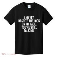 And Yet Despite The Look On My Face YouRe Still Talking Funny Kids T-Shirt thumb 0
