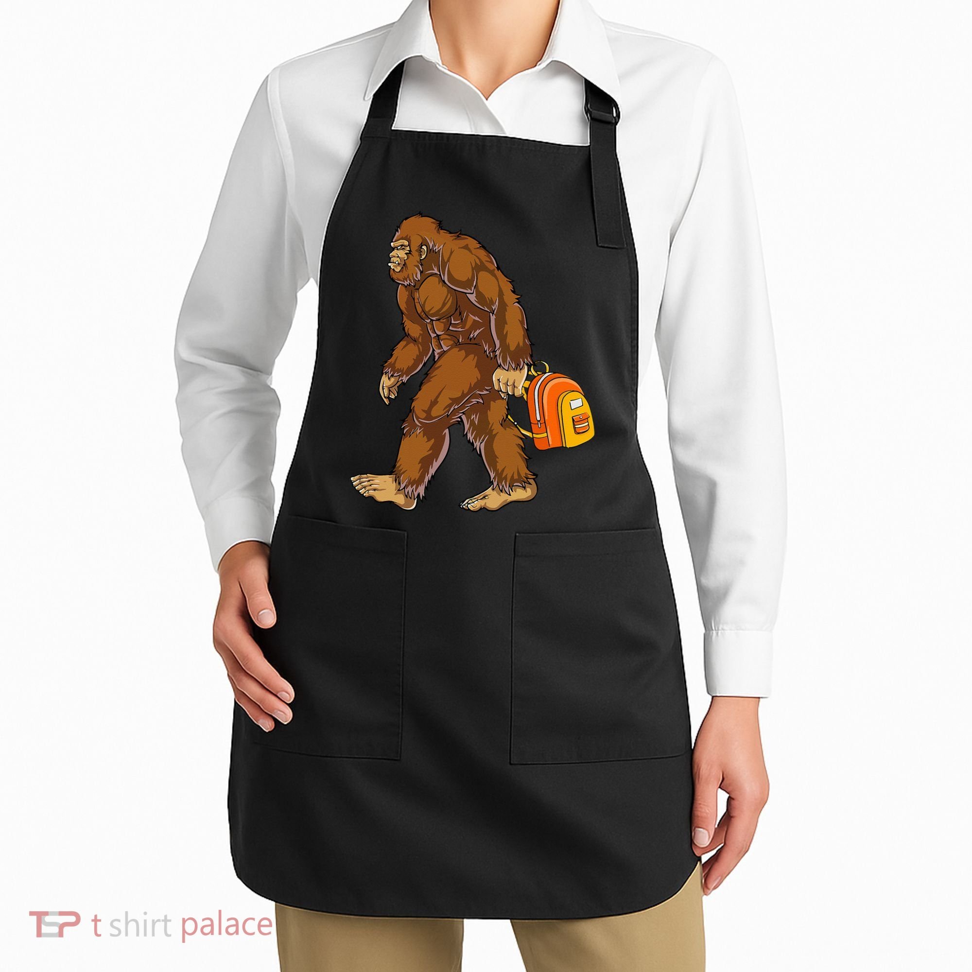 Bigfoot Carrying a Backpack Sasquatch Back To School Funny Apron