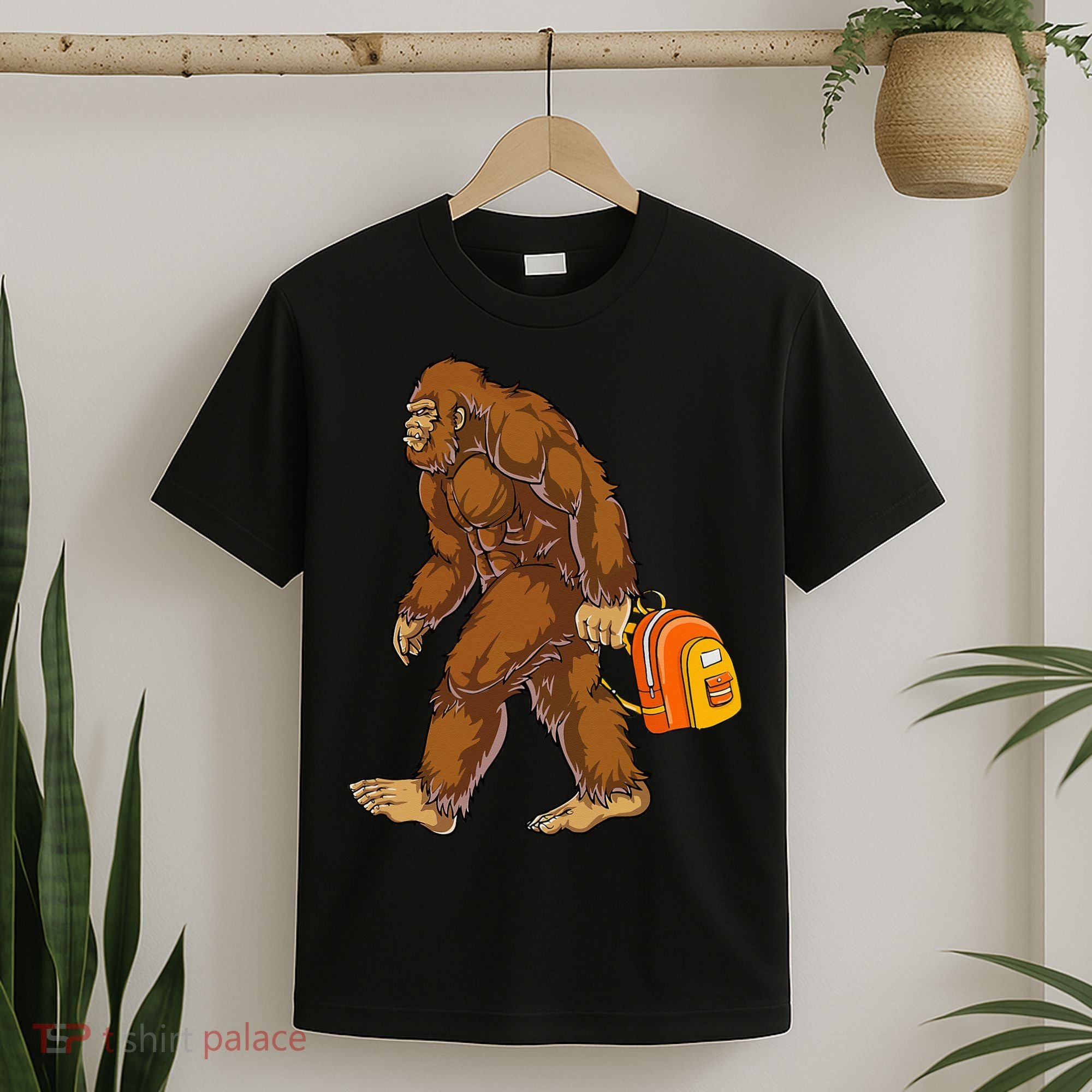 Bigfoot Carrying a Backpack Sasquatch Back To School Funny T-Shirt