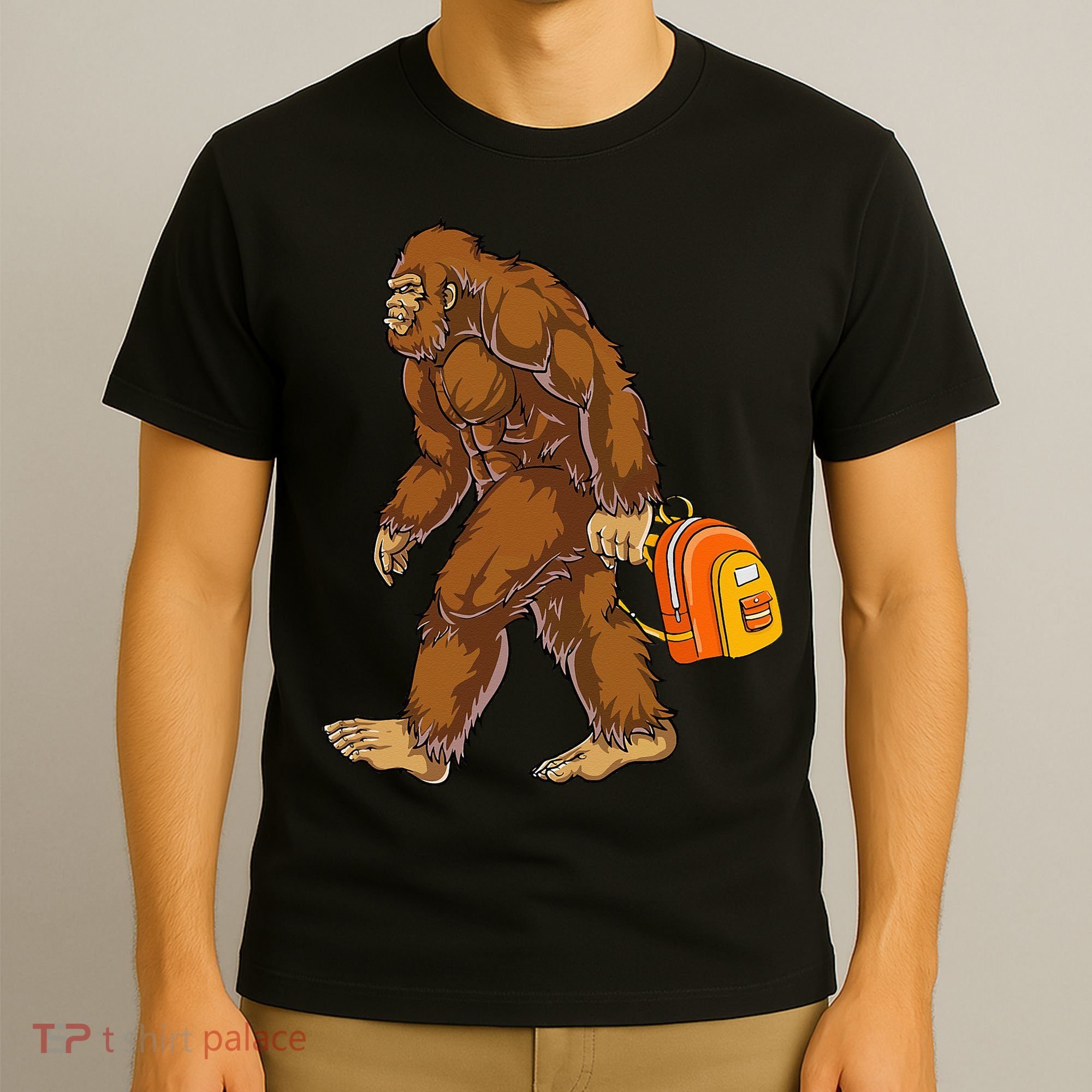 Bigfoot Carrying a Backpack Sasquatch Back To School Funny T-Shirt
