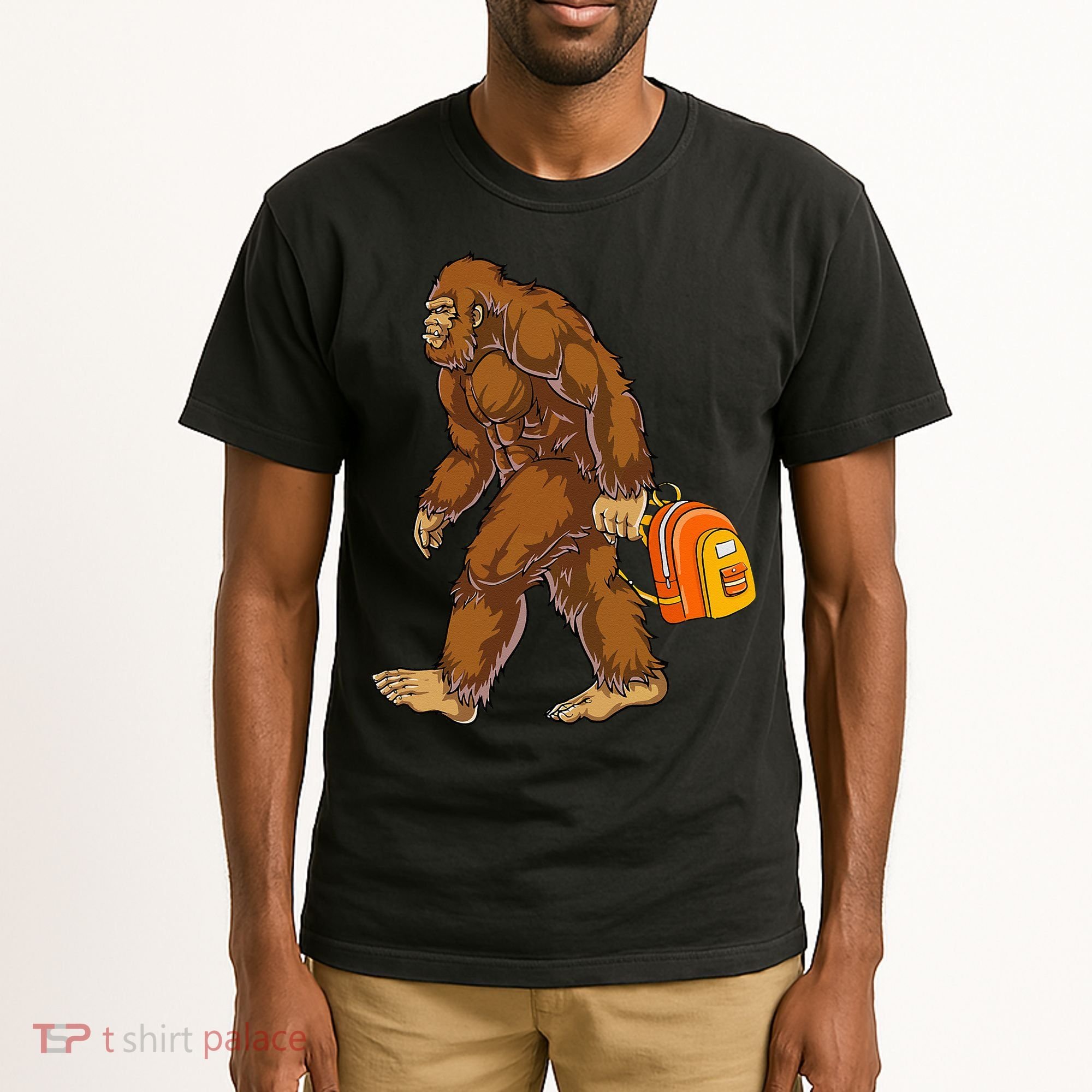 Bigfoot Carrying a Backpack Sasquatch Back To School Funny Tall T-Shirt