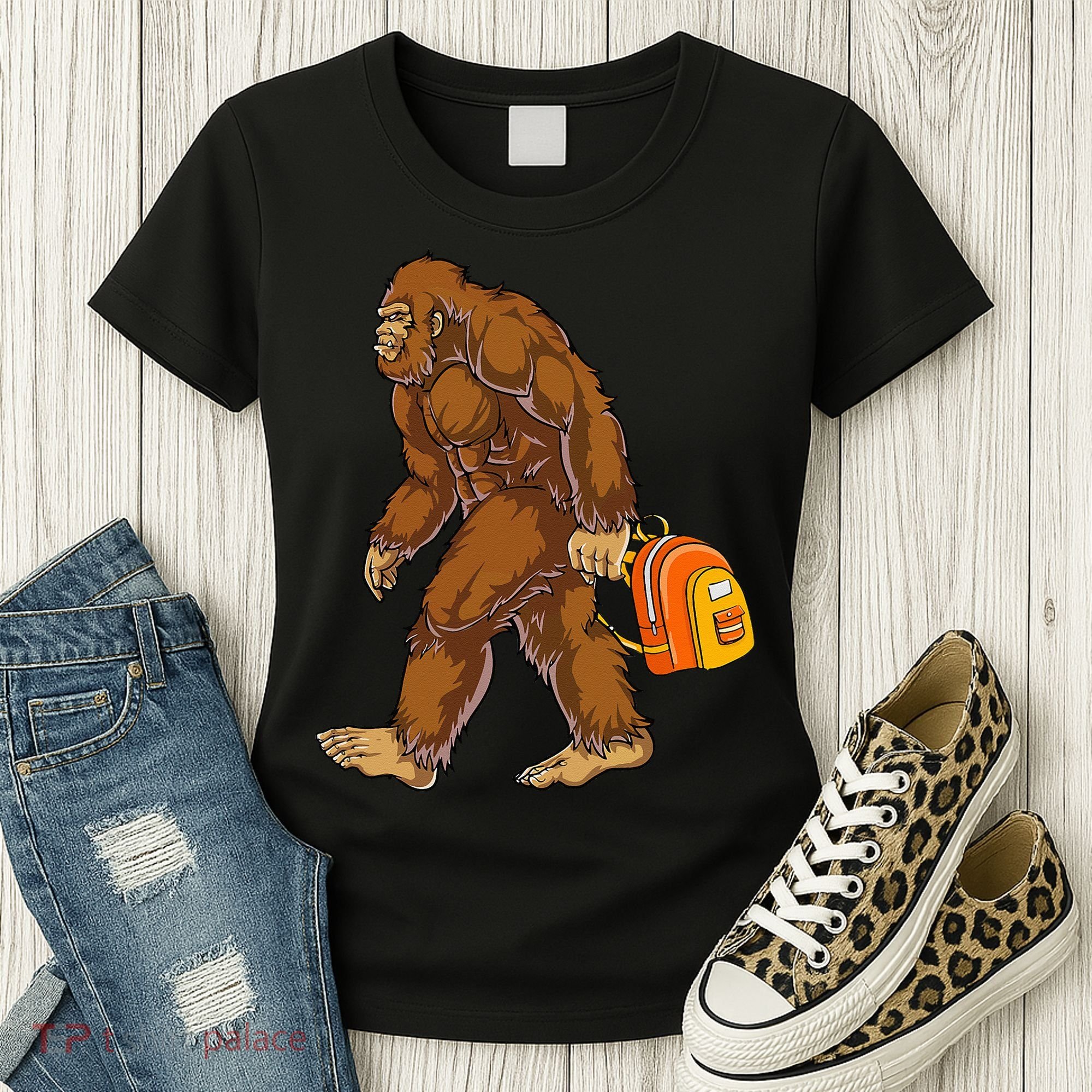 Bigfoot Carrying a Backpack Sasquatch Back To School Funny Women's T-Shirt