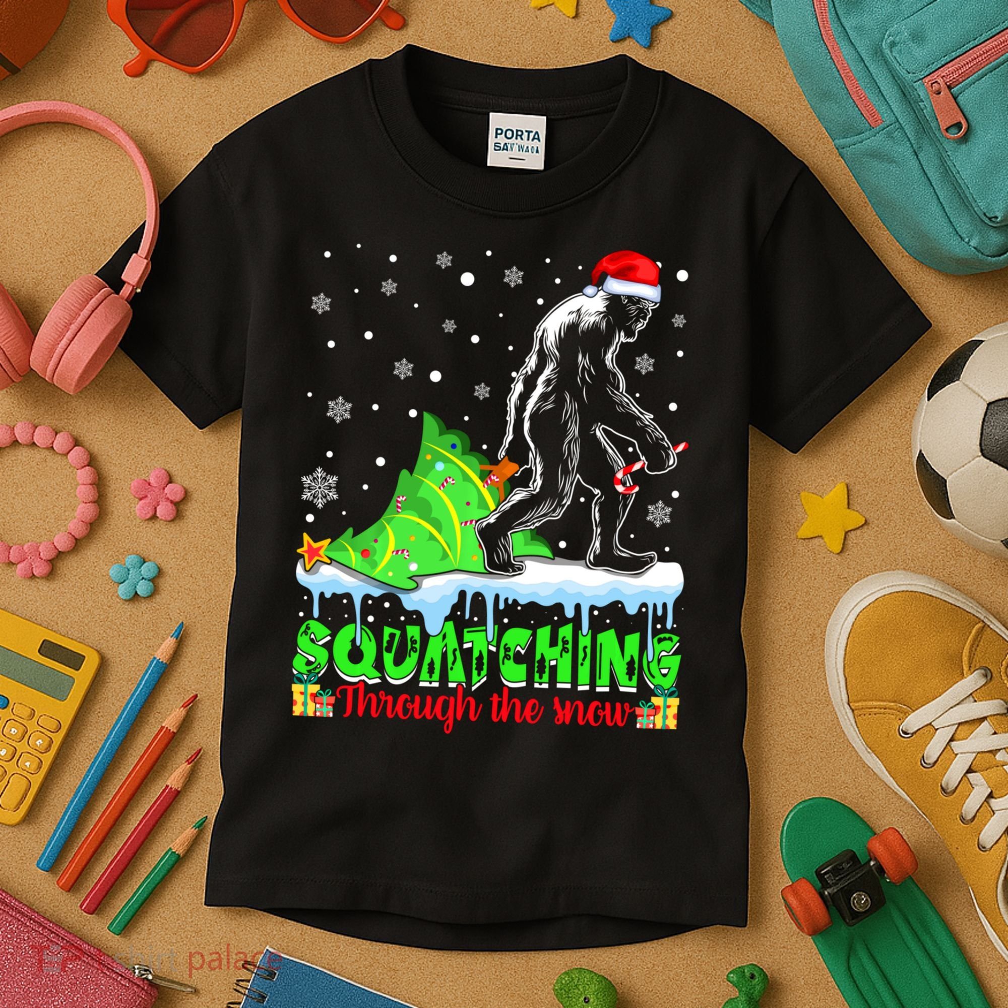 Bigfoot Christmas Tree Squatching Through The Snow Kids T-Shirt