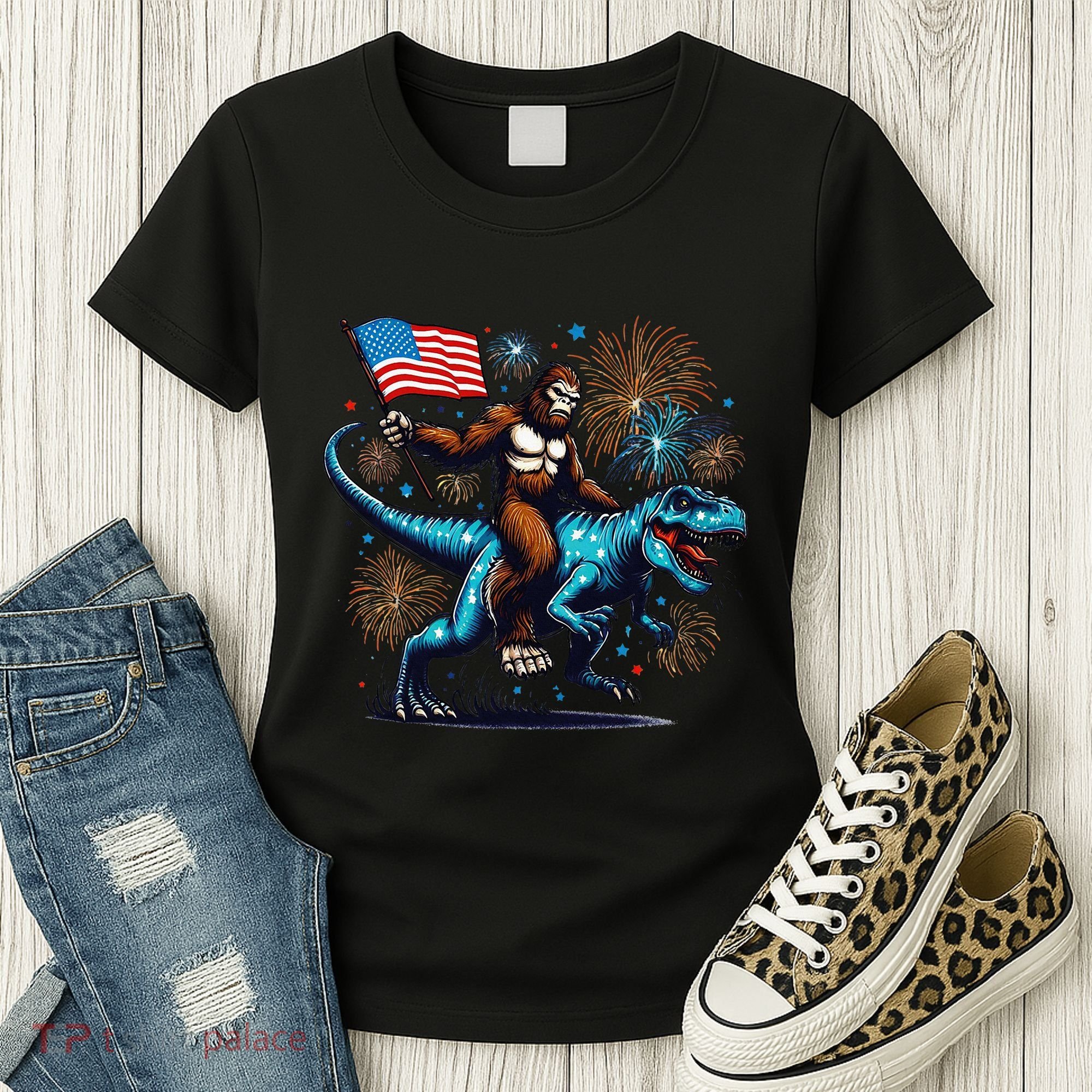 Bigfoot Fireworks Riding A Trex With Usa Flag Women's T-Shirt