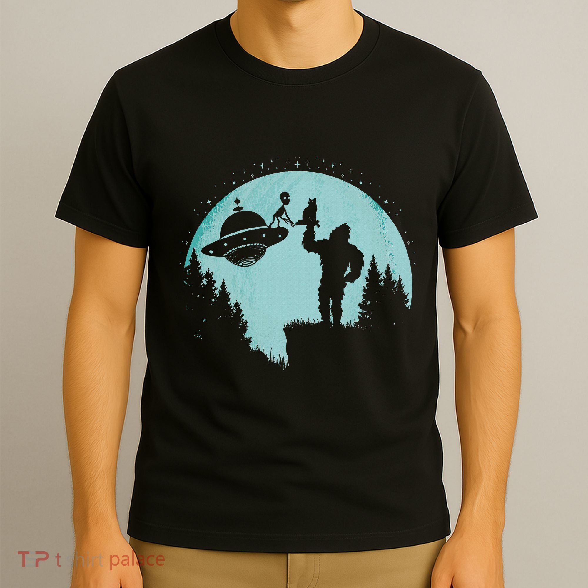 Bigfoot Holding A Cat Funny Alien Riding Ufo Sasquatch Cat T-Shirt