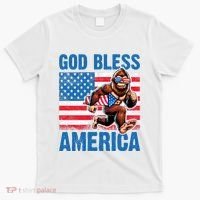 Bigfoot Holding Firework God Bless America T-Shirt thumb 0