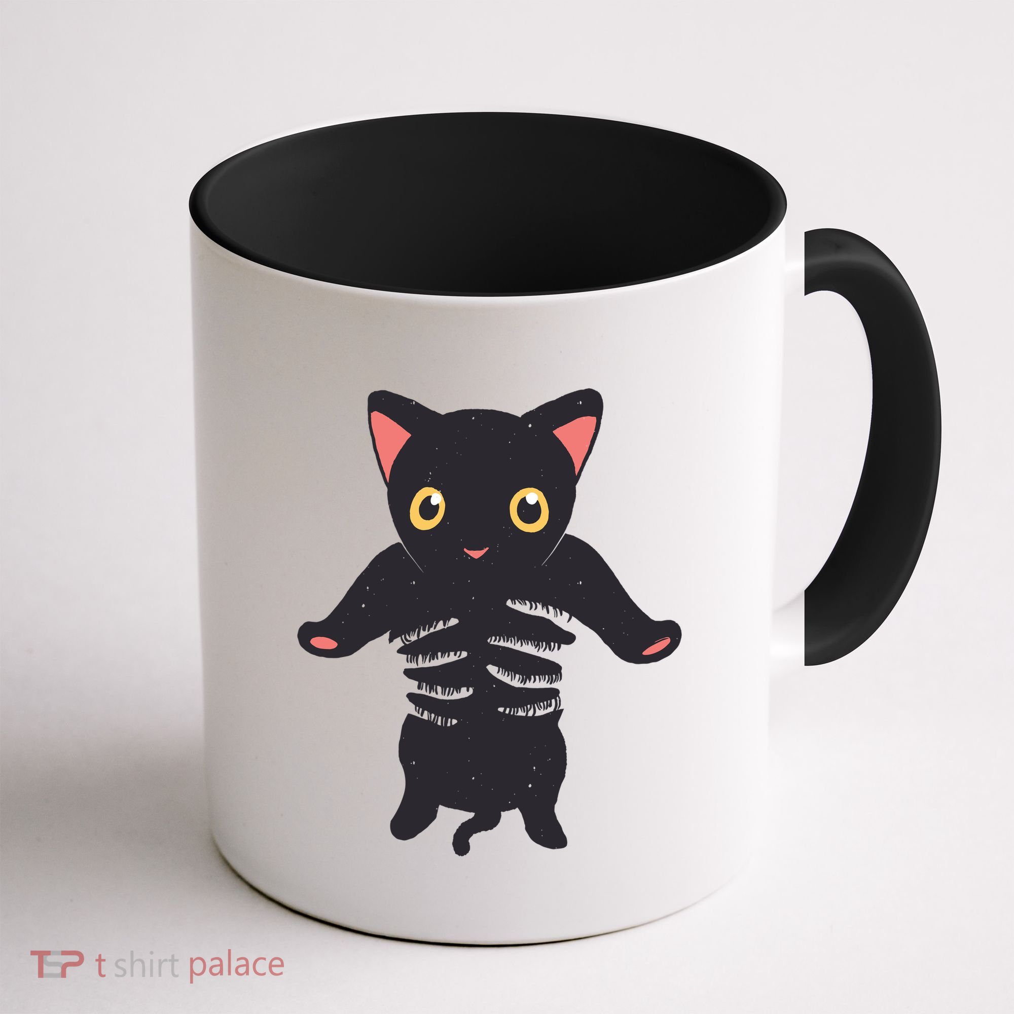 Black Kitty Being Held Coffee Mug