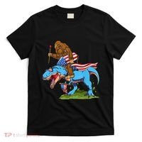 Bigfoot Riding Dinosaur USA Flag 4th Of July America T-Shirt thumb 0