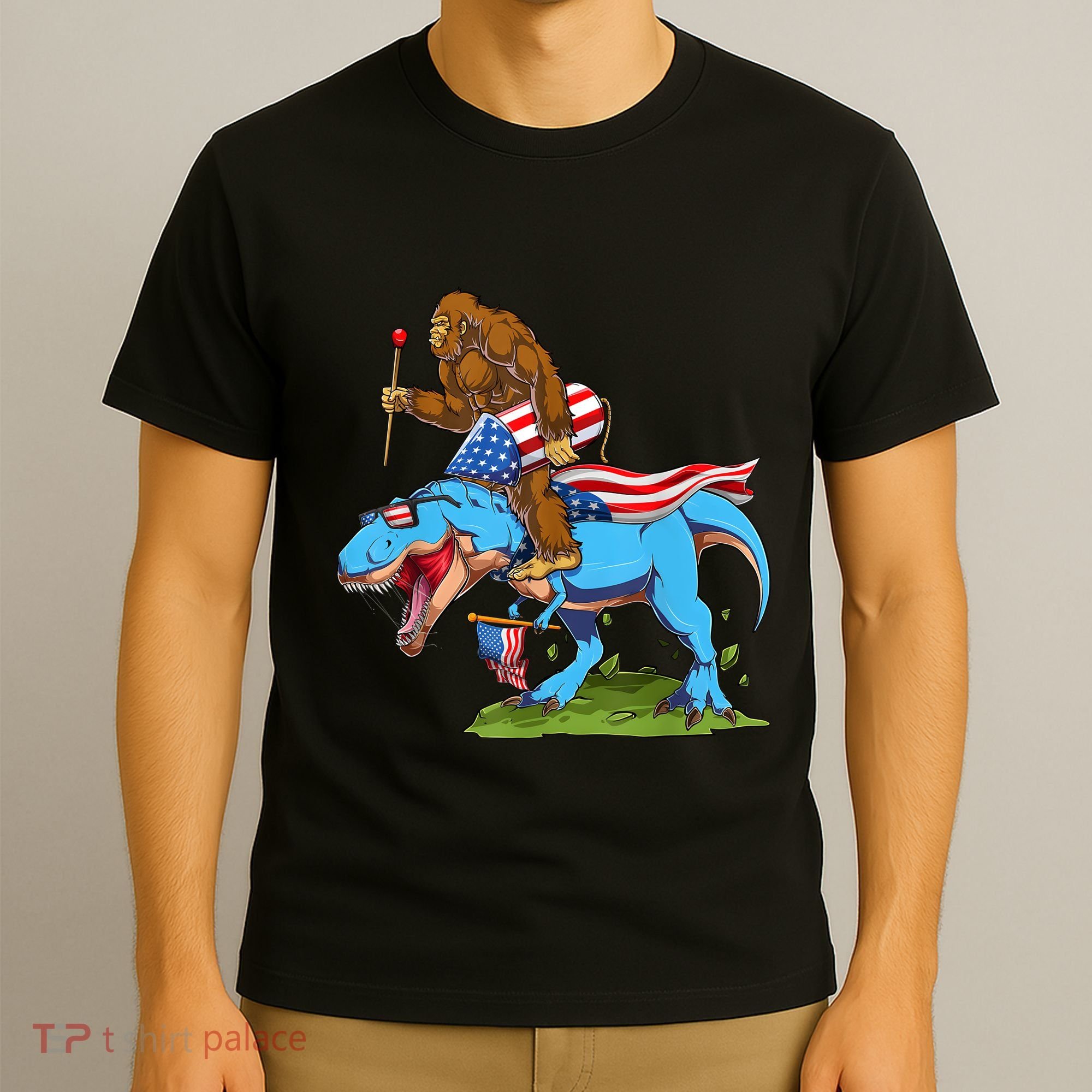 Bigfoot Riding Dinosaur USA Flag 4th Of July America T-Shirt