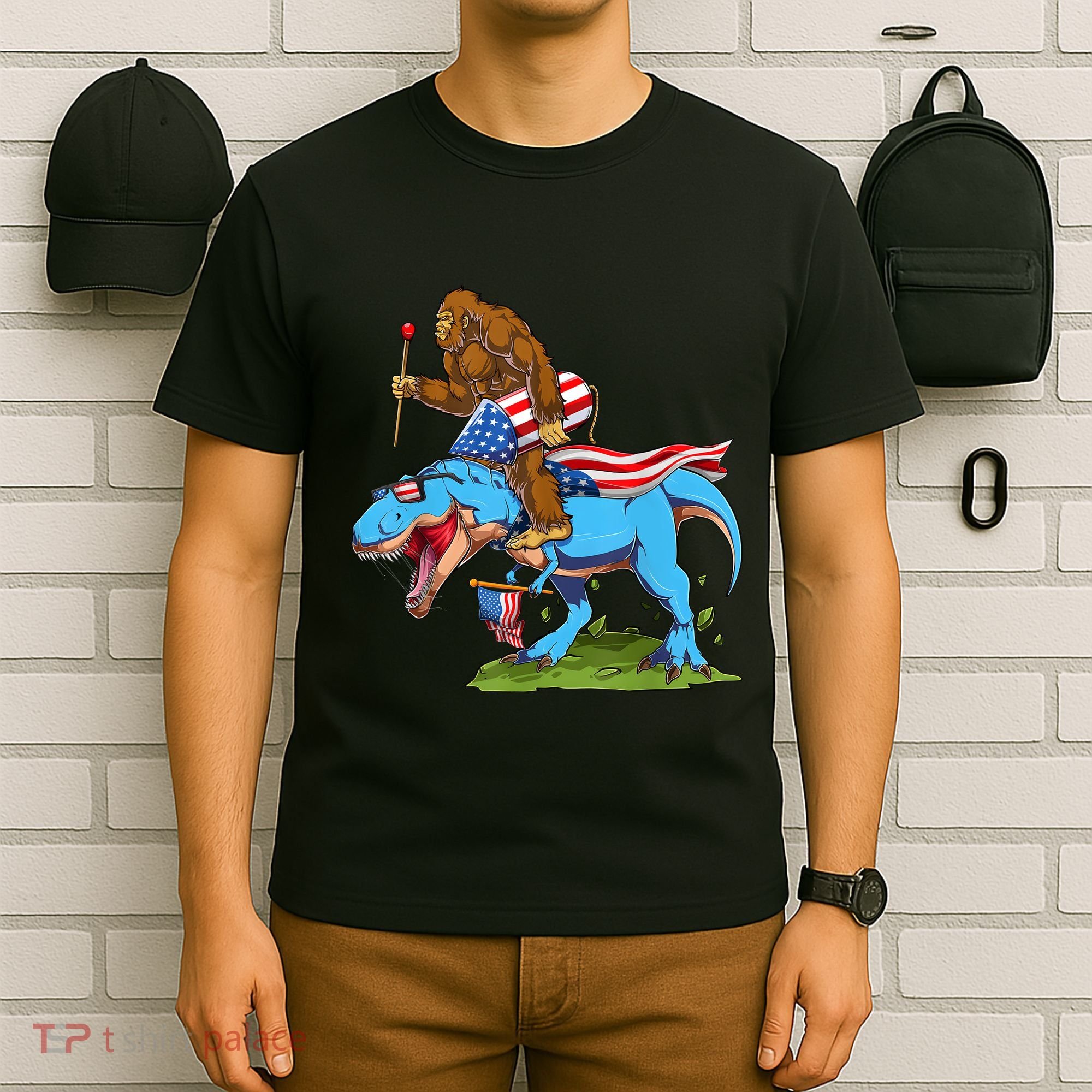 Bigfoot Riding Dinosaur USA Flag 4th Of July America T-Shirt