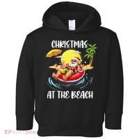 Christmas At The Beach Santa Summer Vacation Beach In July Toddler Hoodie thumb 0