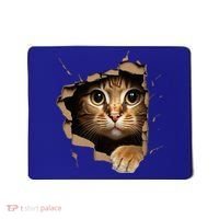 Cute kitten looks from torn fabric - Cats  Mousepad thumb 0