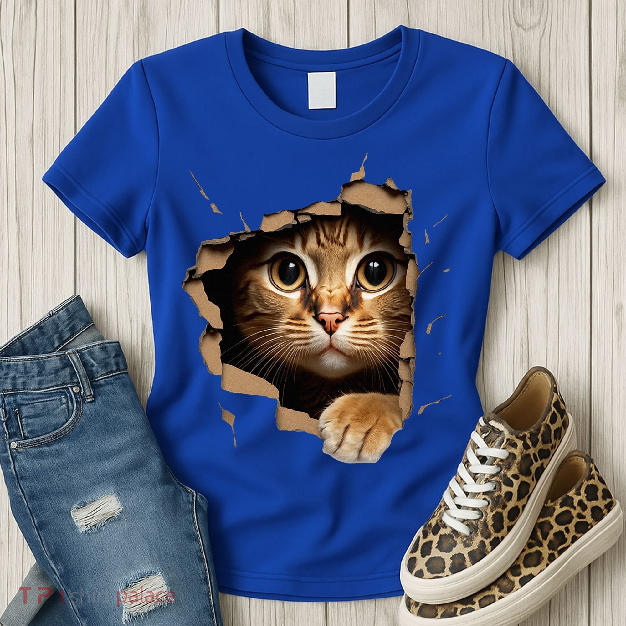 Cute kitten looks from torn fabric - Cats  Women's T-Shirt