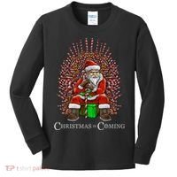 Christmas Is Coming Santa Sitting On Throne Funny Christmas TShirt Kids Long Sleeve Shirt thumb 0