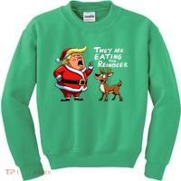 Christmas Santa Claus Trump They Are Eating The Reindeer Kids Sweatshirt thumb 0
