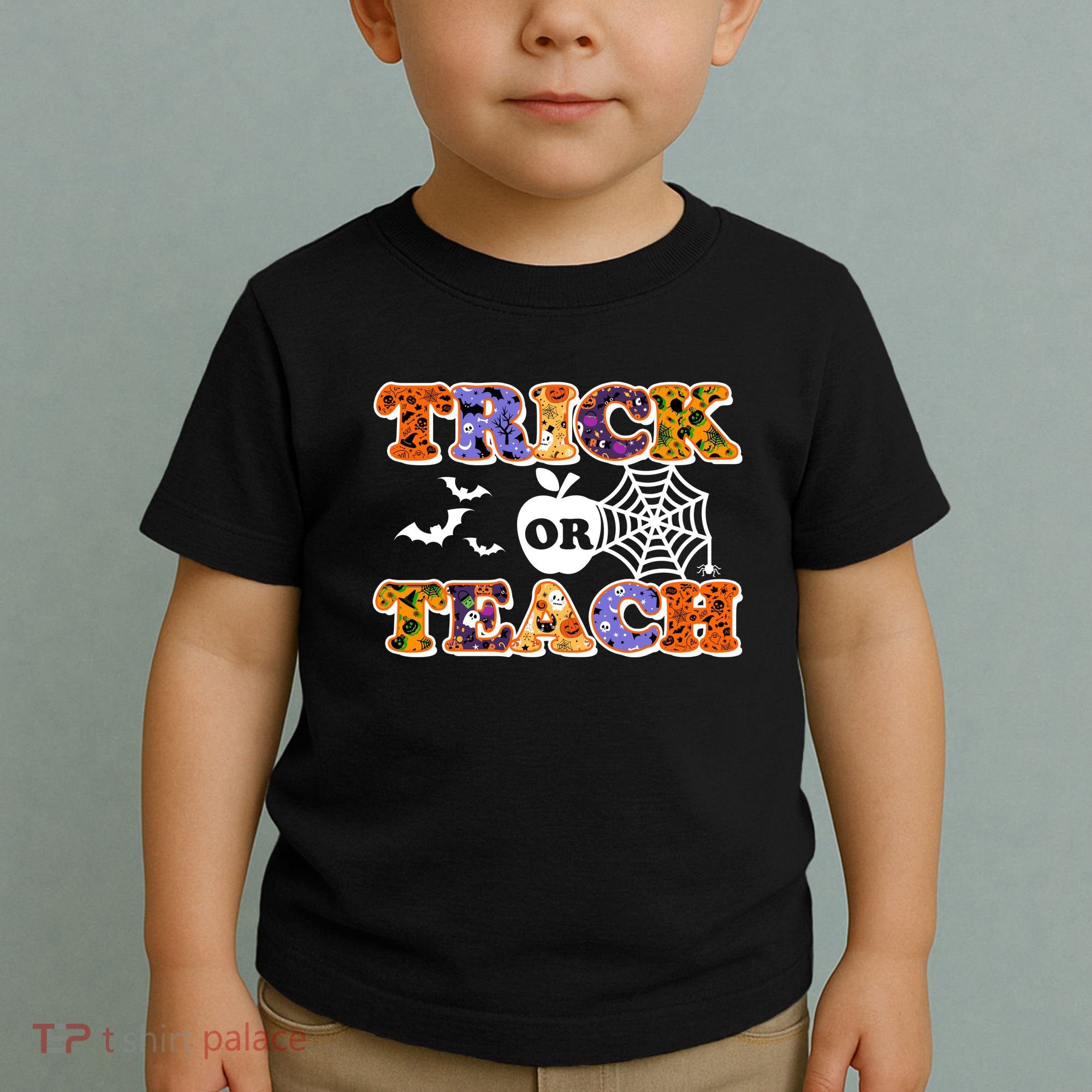Cute Halloween Trick Or Teach Teacher Toddler T-Shirt