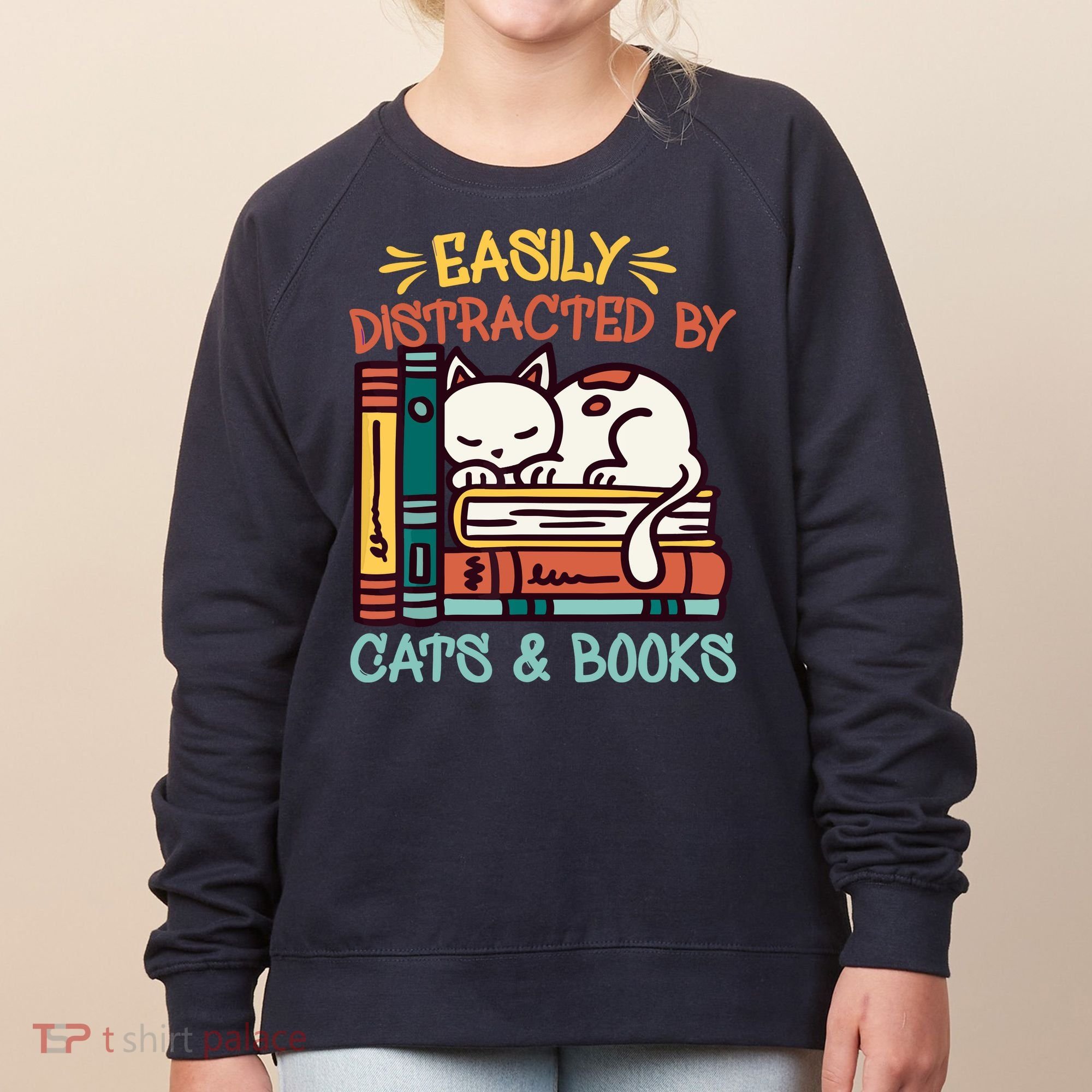 Easily Distracted By Cats And Books Cat & Book Lover Women's Sweatshirt