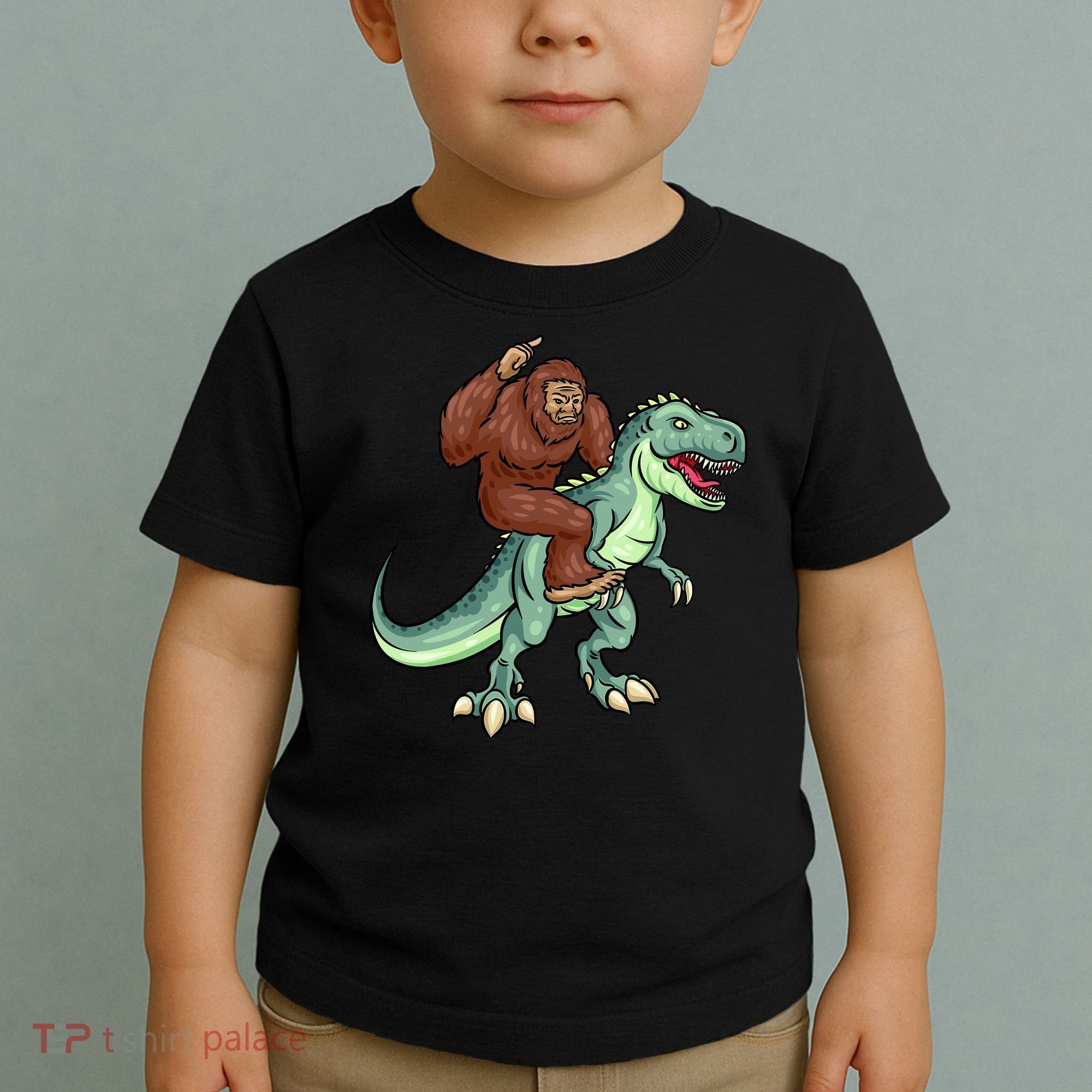 Funny Bigfoot Riding T Rex Funny Bigfoot Dinosaur Toddler T-Shirt