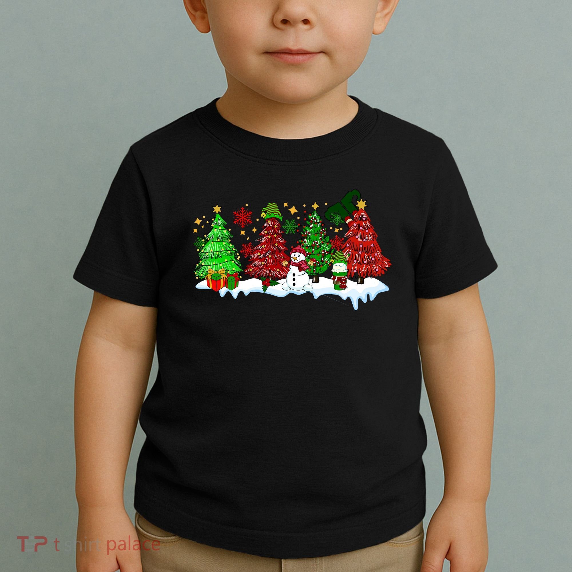 Funny Christmas Elf In Tree With Snowman Scene Toddler T-Shirt