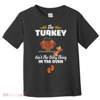 Funny Cute The Turkey Ain't The Only Thing In The Oven Turkey Toddler T-Shirt thumb 0