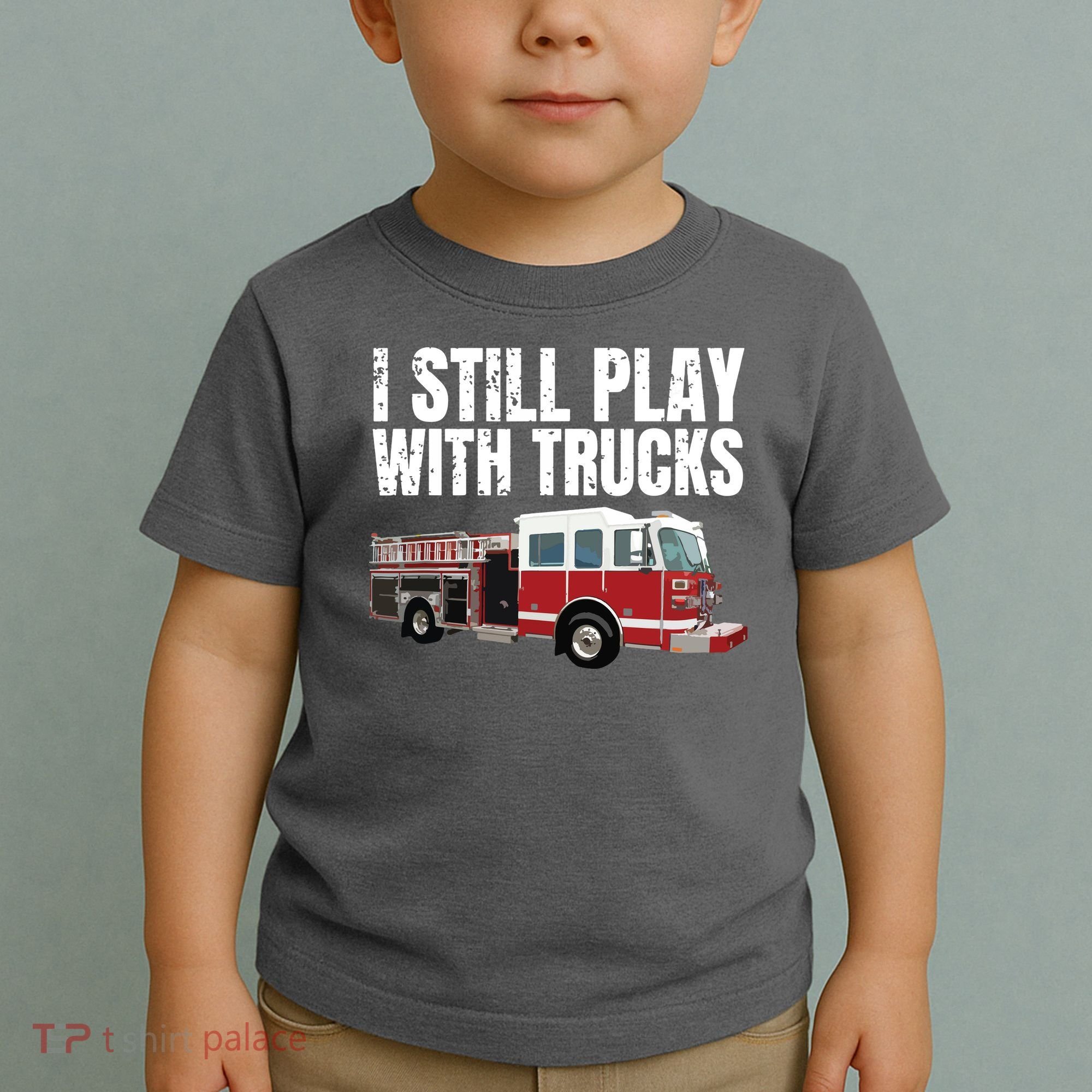 Funny Firefighter I Still Play With Fire Trucks Toddler T-Shirt