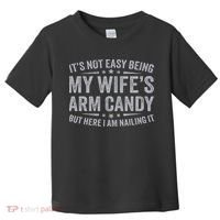 Funny Husband It's Not Easy Being My Wife's Arm Candy Toddler T-Shirt thumb 0