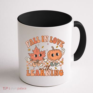 Fall In Love With Learning Teacher Trick Or Teach Teacher Gift Coffee Mug back