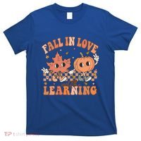 Fall In Love With Learning Teacher Trick Or Teach Teacher Gift T-Shirt thumb 0