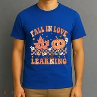 Fall In Love With Learning Teacher Trick Or Teach Teacher Gift T-Shirt thumb 3