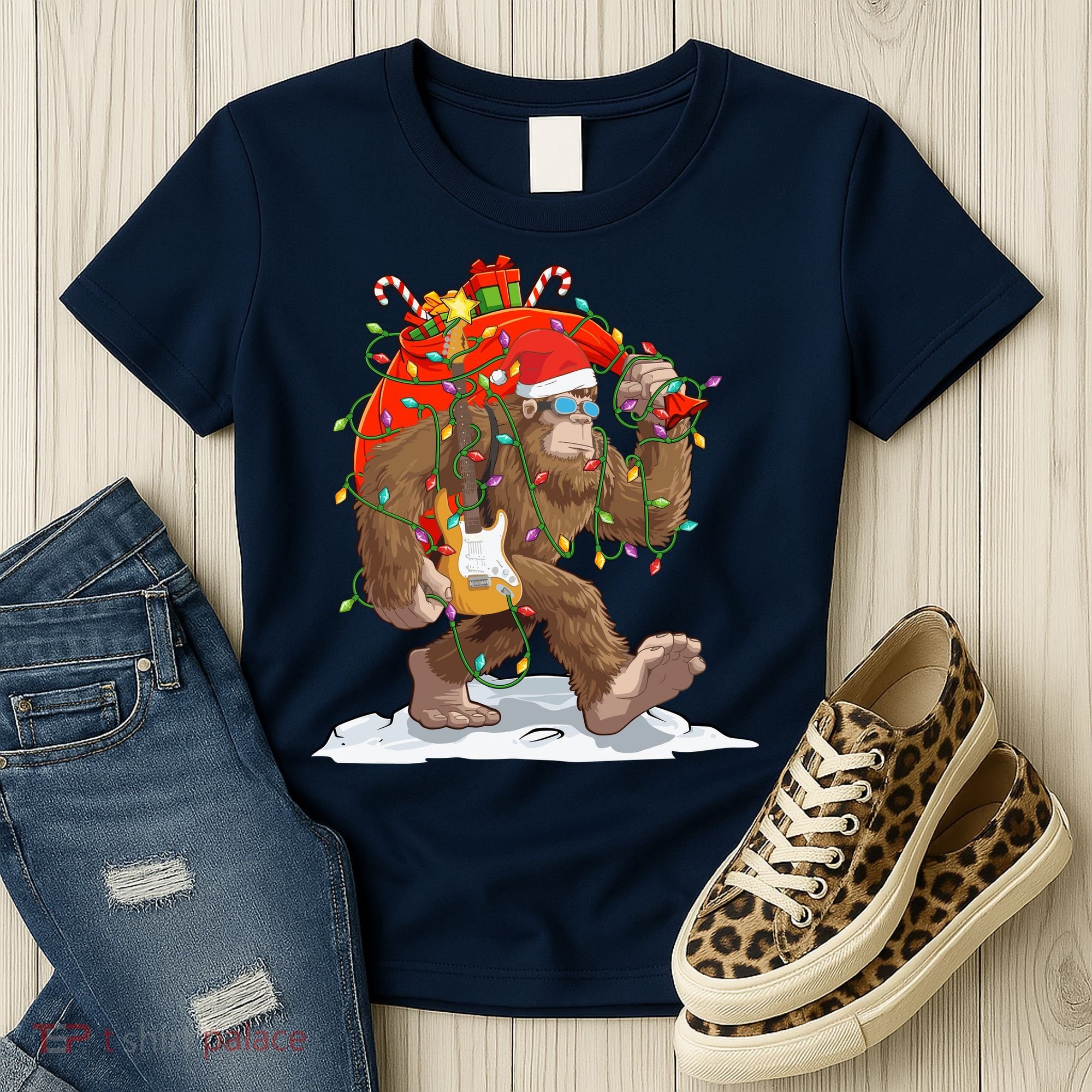 Funny Santa Bigfoot Christmas Lights Rock Sasquatch Believe Women's T-Shirt